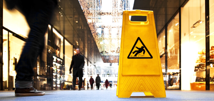 Caution Wet Floor sign which will prevent a slip and fall