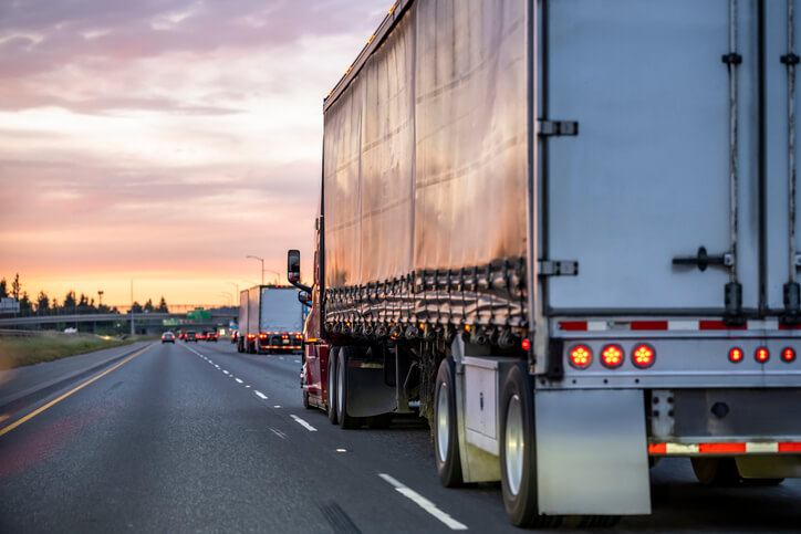 Truck driving down the road