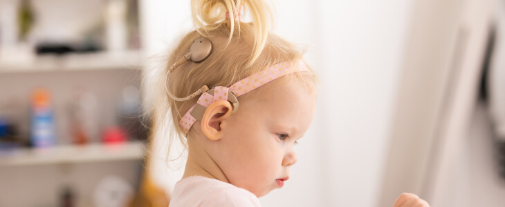Baby girl with a cochlear implant