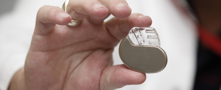 Person holding a pacemaker